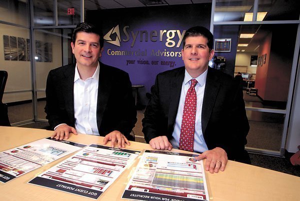 Rich Harris, left, and Dave Harris developed a commercial real estate software program.